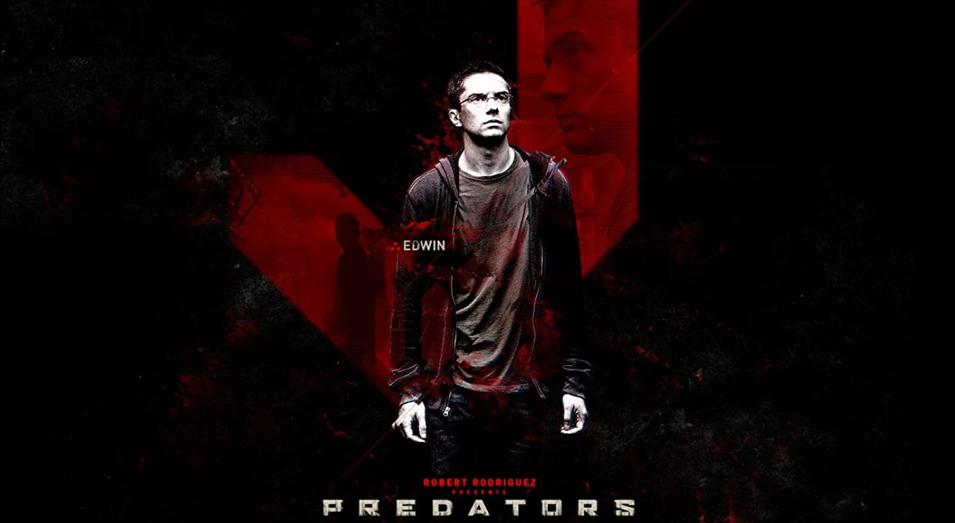 Edwin from Predators, played by Topher Grace