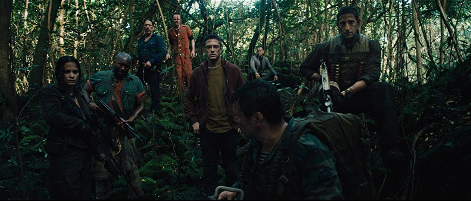 Edwin in his red shirt, planted dead-center among the doomed group in the alien jungle